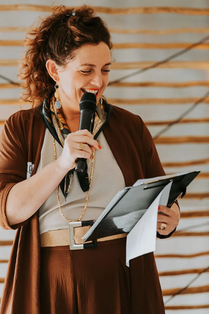 Lorenza speaking, August 2025