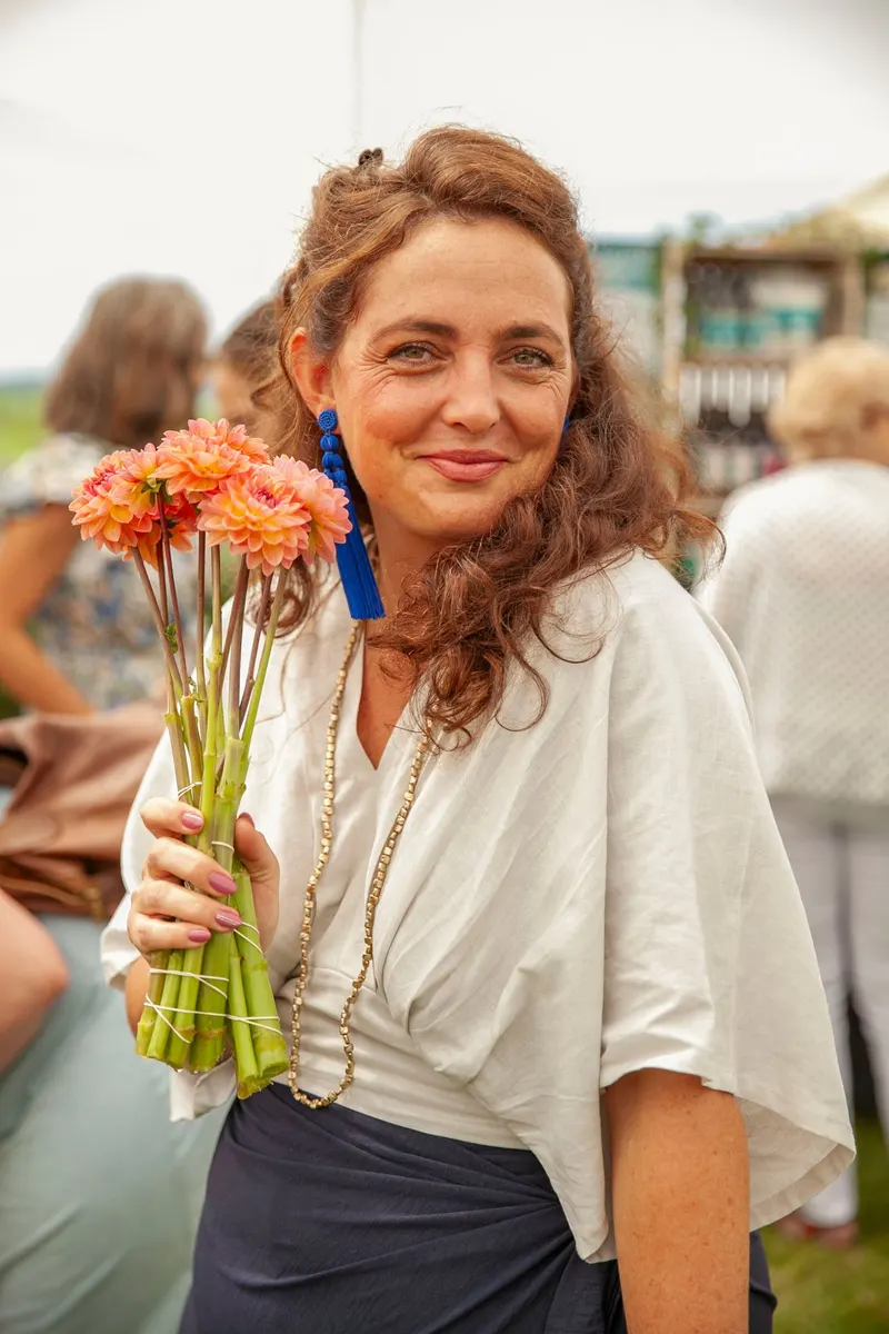Lorenza with flowers at the Gwen Event in George