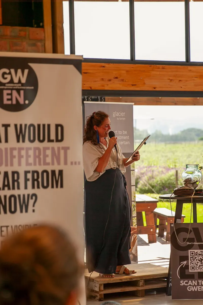 A speaker beside the GWEN banner, George