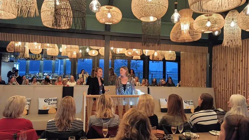 Two speakers at the front of the room upstairs at Sirocco, July 2024