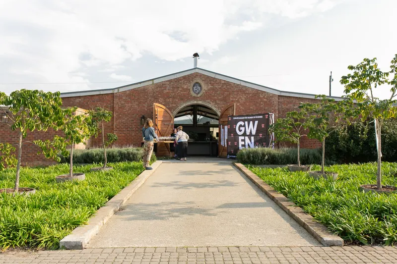 The way in to the barn at Kay & Monty Vineyards, the GWEN banner at the door