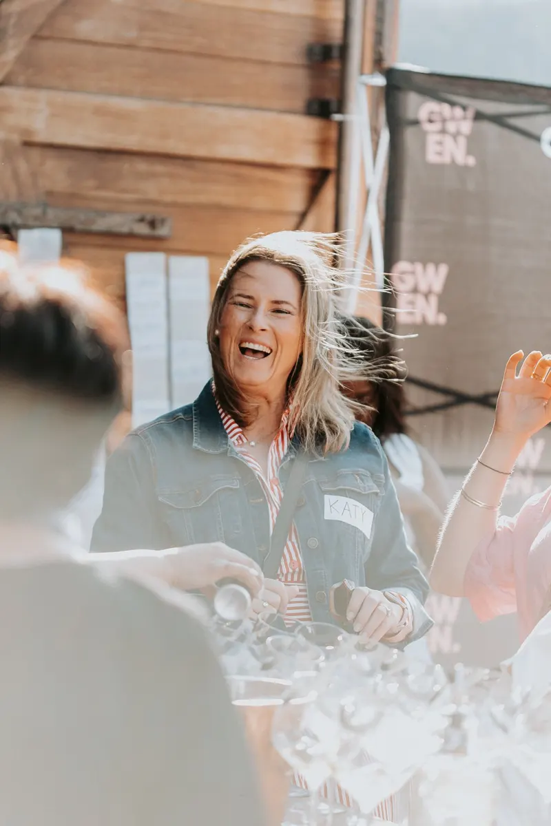 A member laughing on arrival, June 2026