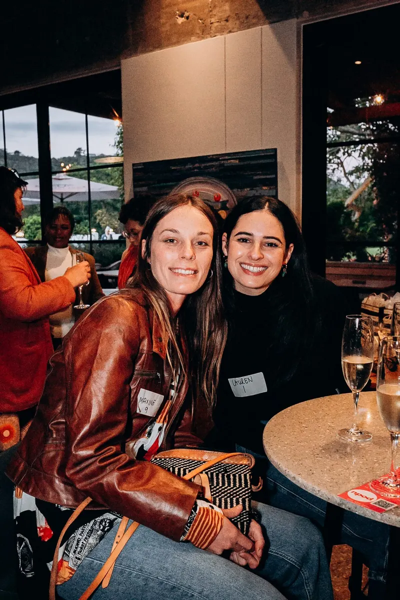 Two members at a table, May 2025