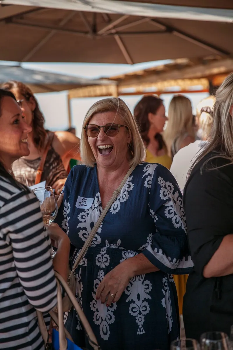 A member laughing at the Gwen Event in George